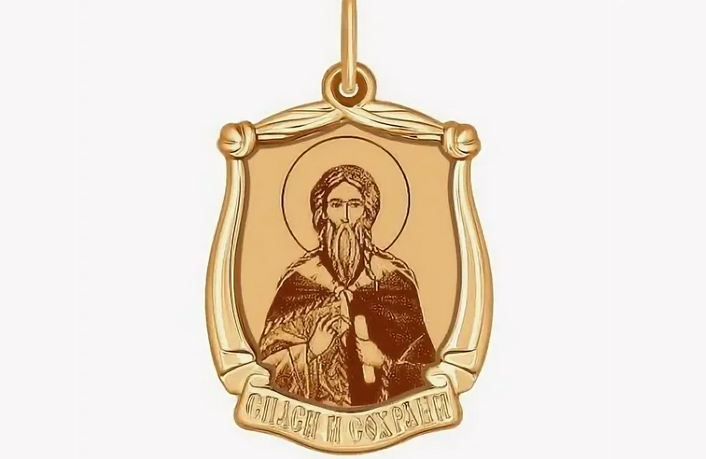 Подвеска с ликом святого из золота