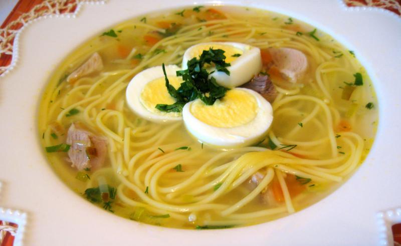Chicken soup with vermicelli and egg.