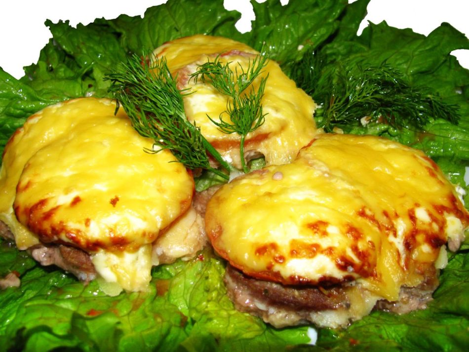 Delicious pork medallions with cheese, mushrooms
