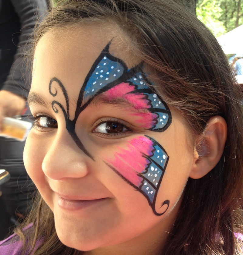 Papillon Aquagram sur une partie du visage