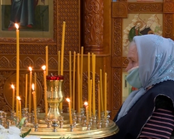 Why are grandmothers in the church extinguish candles?