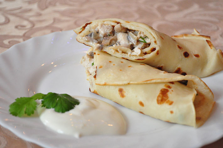 Pancakes with chicken and mushroom filling.