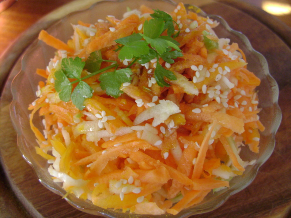Salad with celery, pumpkin, carrots and apple