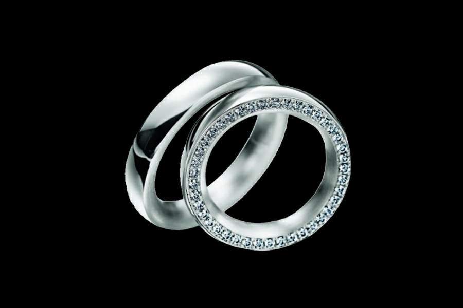 Anéis de casamento de platina brilhantes