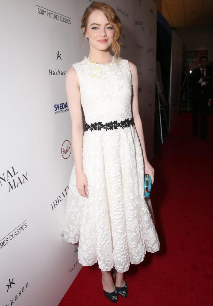 Romantic Emma Stone in a lace white dress