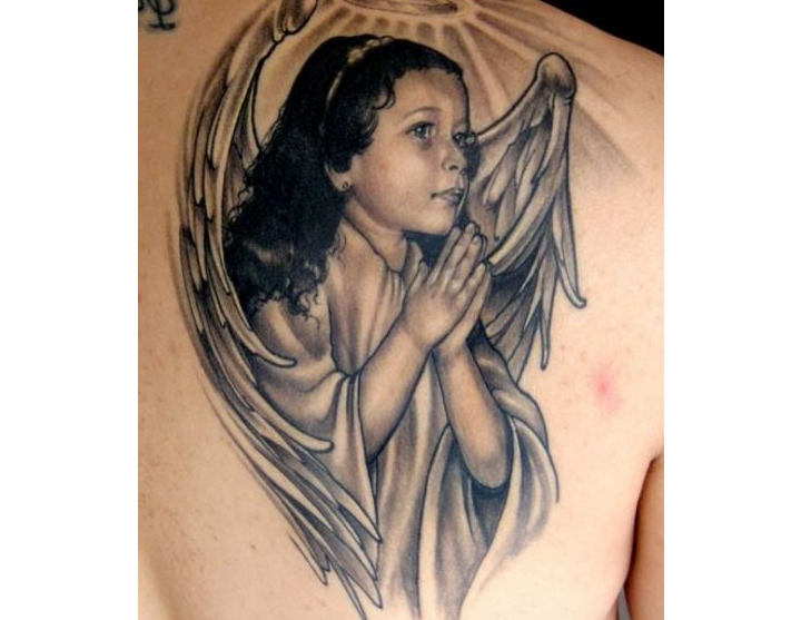 Tattoo on a shoulder blade for girls - mythical creatures