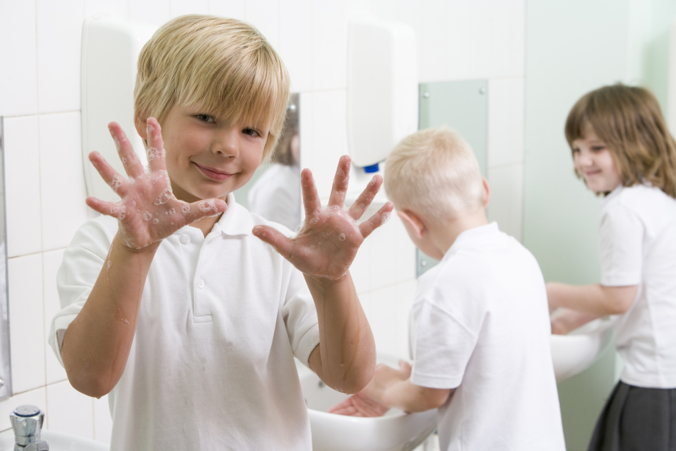 Children wash their hands