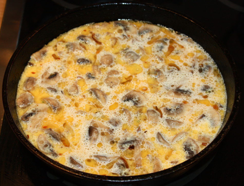 Potatoes with eggs and mushrooms