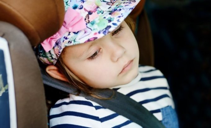 The child may feel sick if he was rocked in the car.