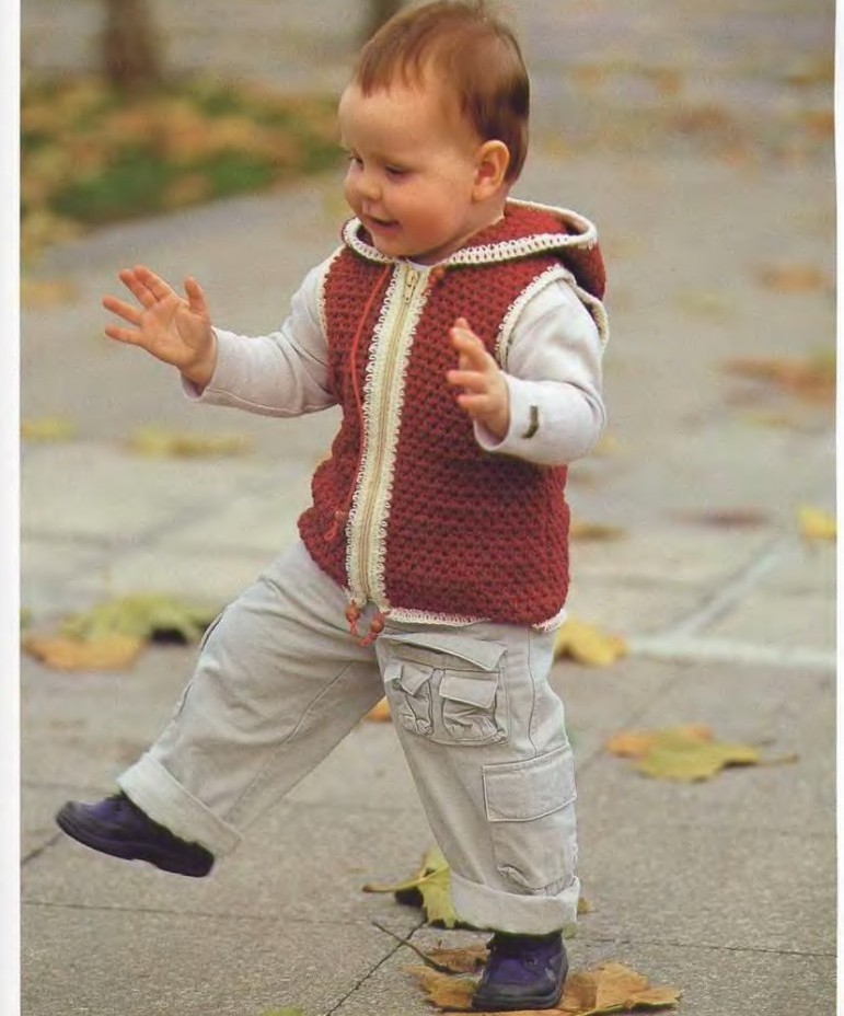 Beautiful, fashionable children's vest for a boy with a hood knitting