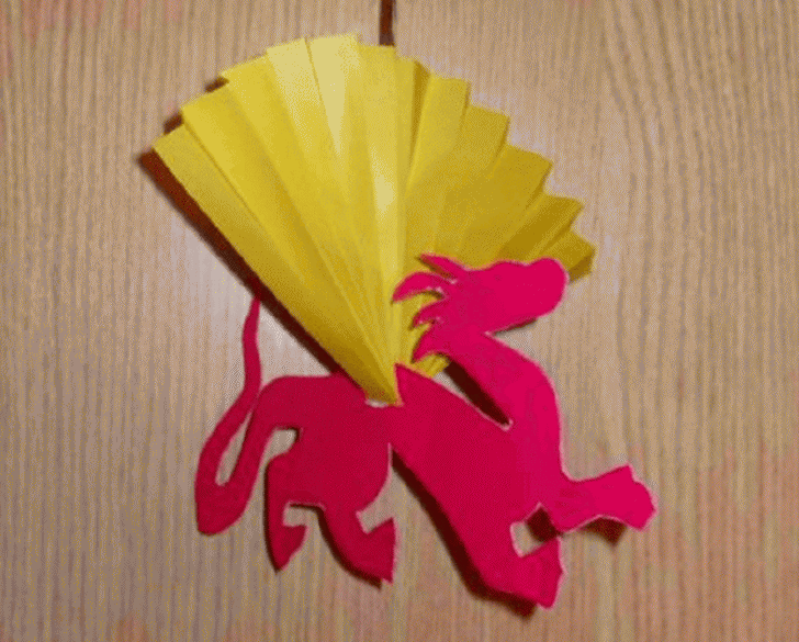 Dragon from colored paper and cardboard