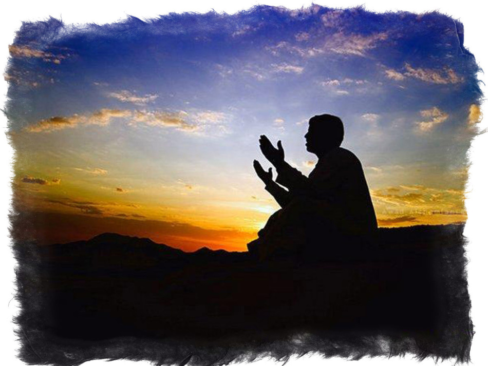 Muslim raised his hands to the sky during prayer