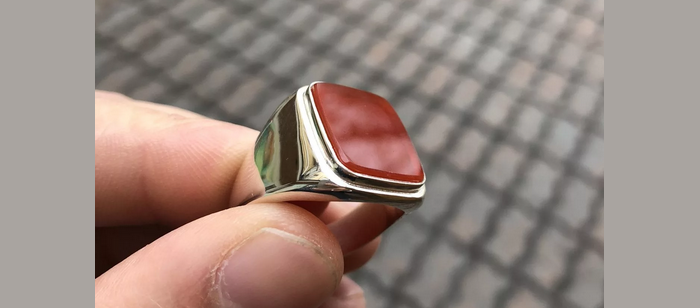 Men's ring with a red-staman named after red jasper