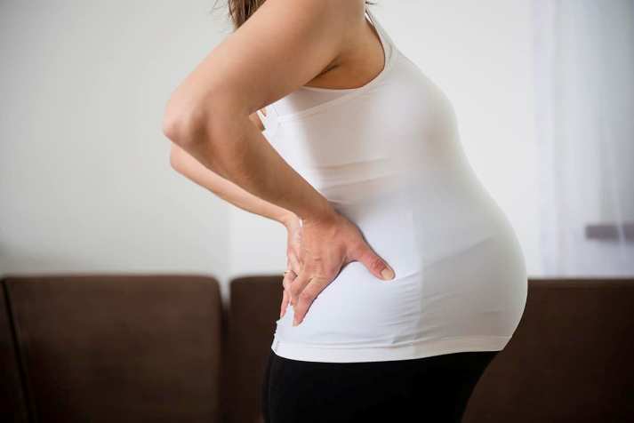 The spine hurts after sleep during pregnancy