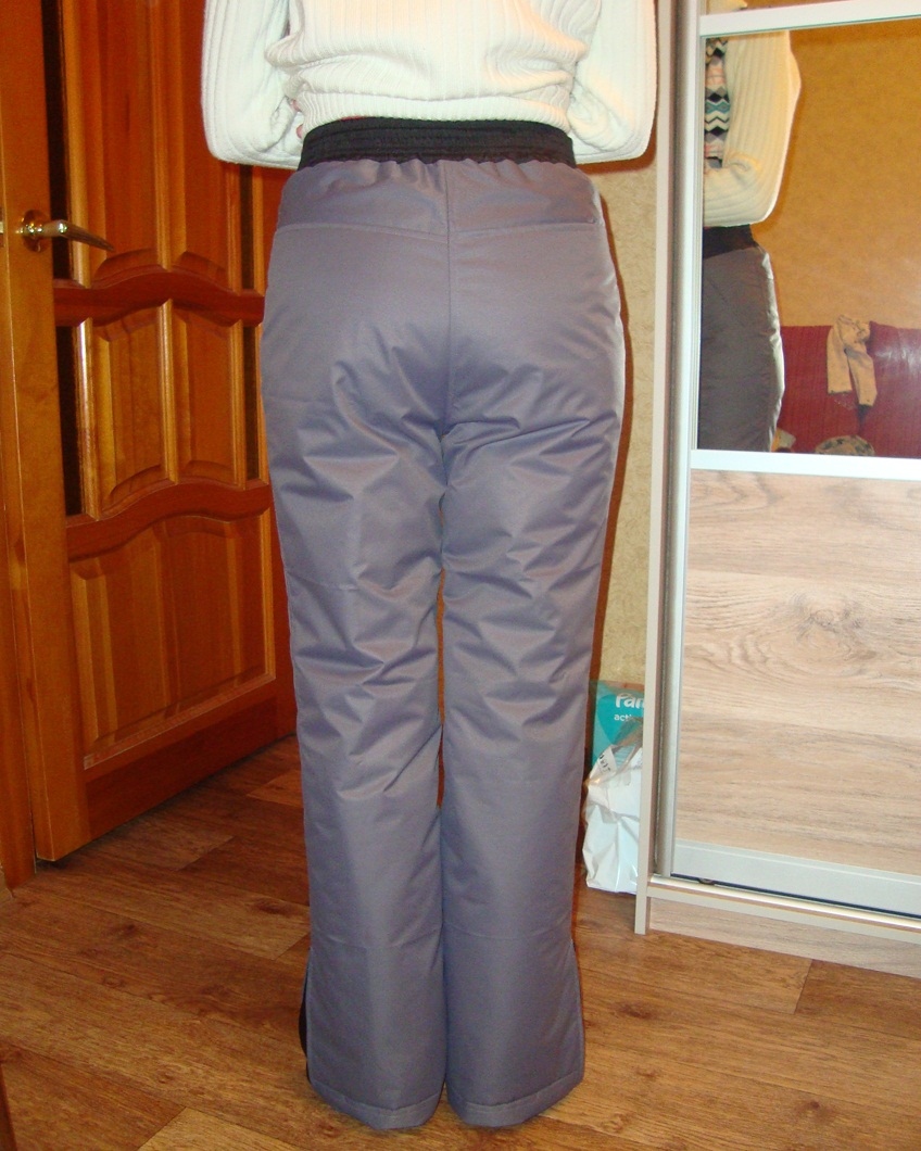 The girl has insulated trousers sewn with her own hands