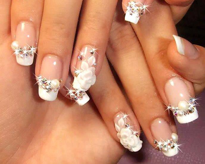 Manicure for the bride with modeling and rhinestones