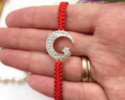 Viselhetnek -e muszlimok piros szálat a csuklón: Viselhetek amuletteket?