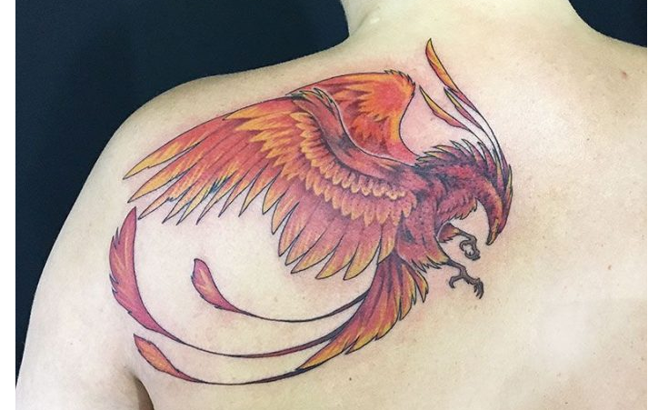 Tattoo on a shoulder blade for girls - mythical creatures
