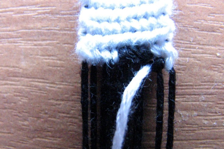 We weave black threads