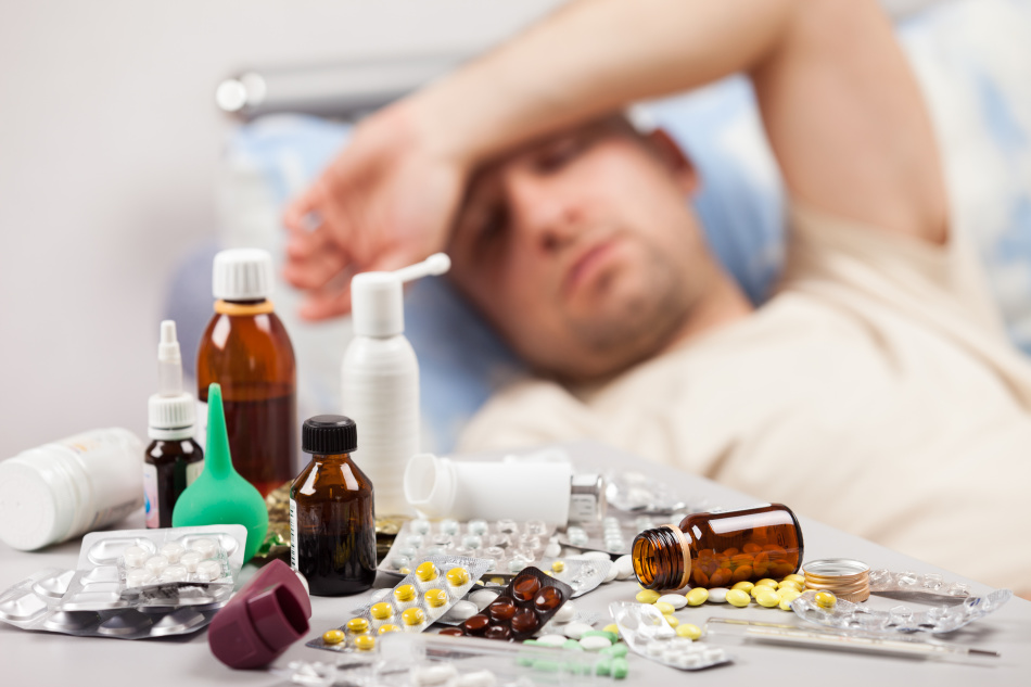 A sick man with medicines