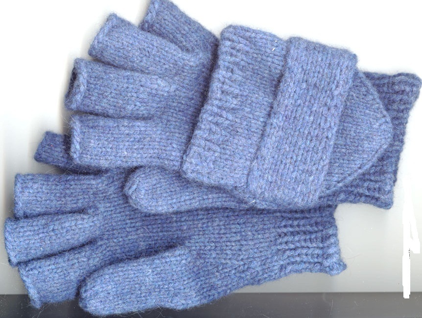 Blue gloves for a boy with knitting needles