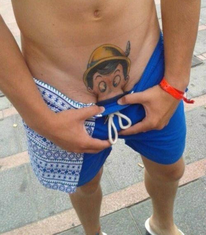 Пример мужской интимной татуировки в виде Пиноккио. 