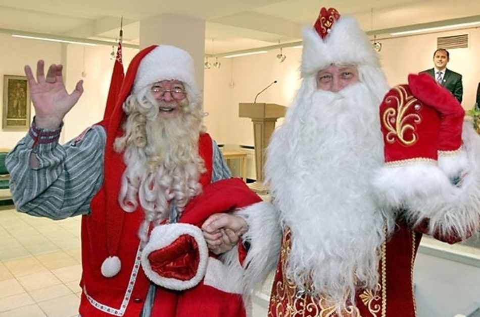 Santa Klaus dan Santa Claus bertemu di pesta perusahaan