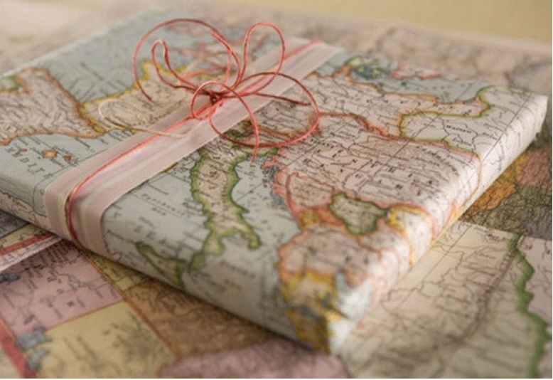 Учителю по географии можно упаковать коробку конфет в карту