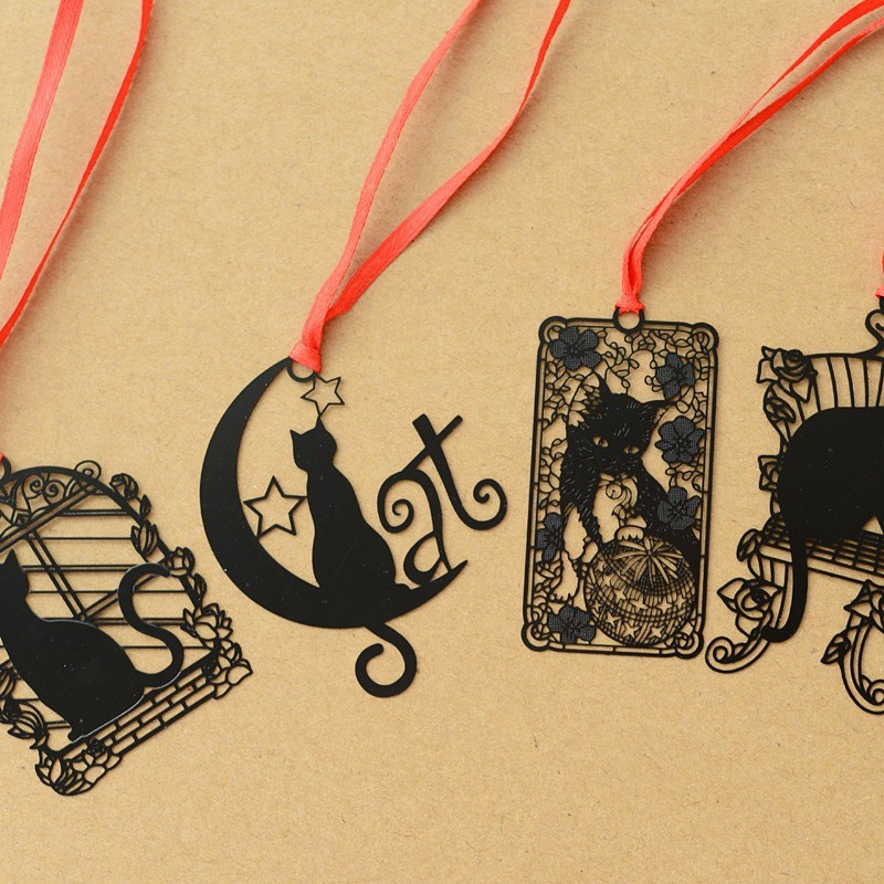 Bookmarks for books in the form of black cats
