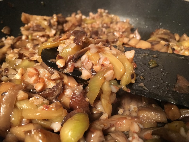 The process of frying mushrooms and onions