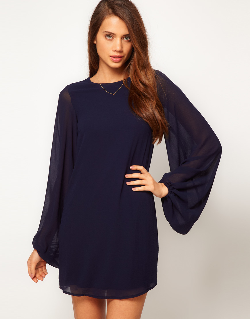 Πώς να αγοράσετε ένα σύντομο φόρεμα με ένα μακρύ μανίκι για το Aliexpress: Review, Catalog, Price