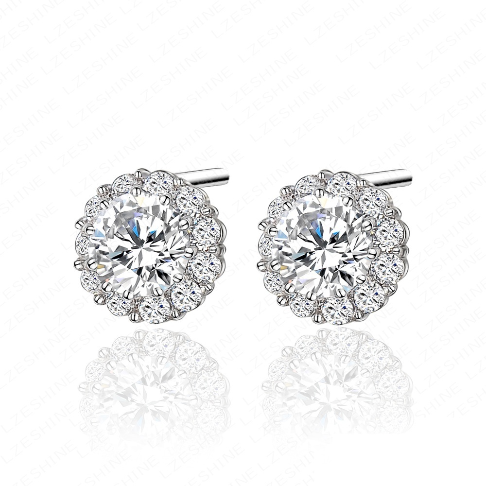Such white gold earrings with diamonds harmonize with an evening outfit