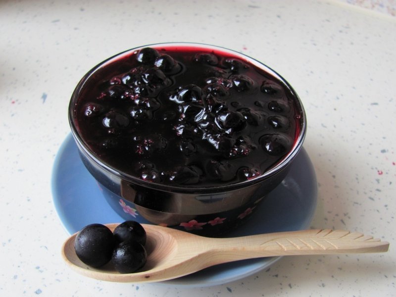 Piala with blackcurrant jam - raw materials for home wine