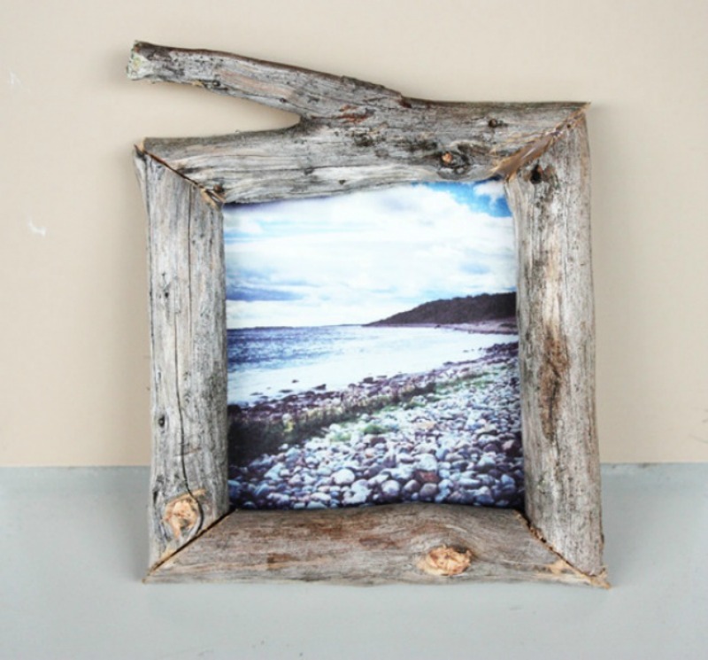 However, a photo frame from large pieces of wood will also look great