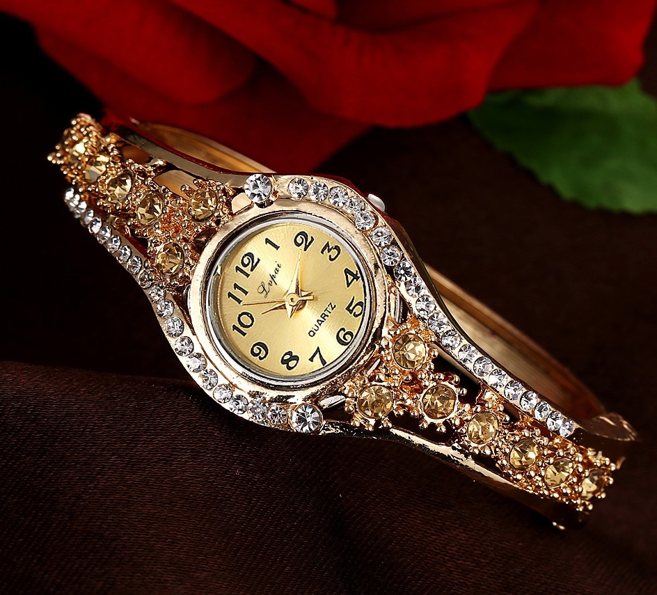 LPVAI watch with gold stones