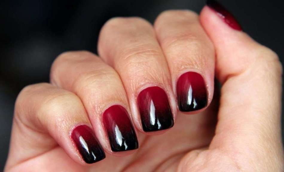 Gradient manicure is red-black