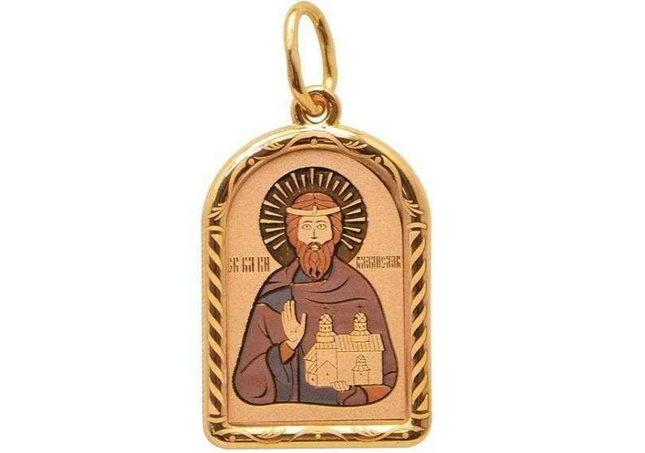Pendentif d'or avec le visage d'un saint