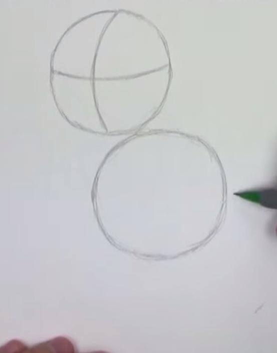 We draw two circles. We draw two lines in the upper