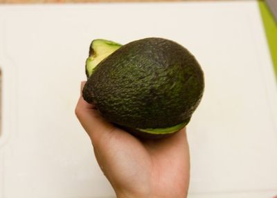 Halves of avocado are separated from each other