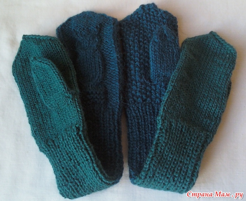 Warm knitted double mittens not in a collected state