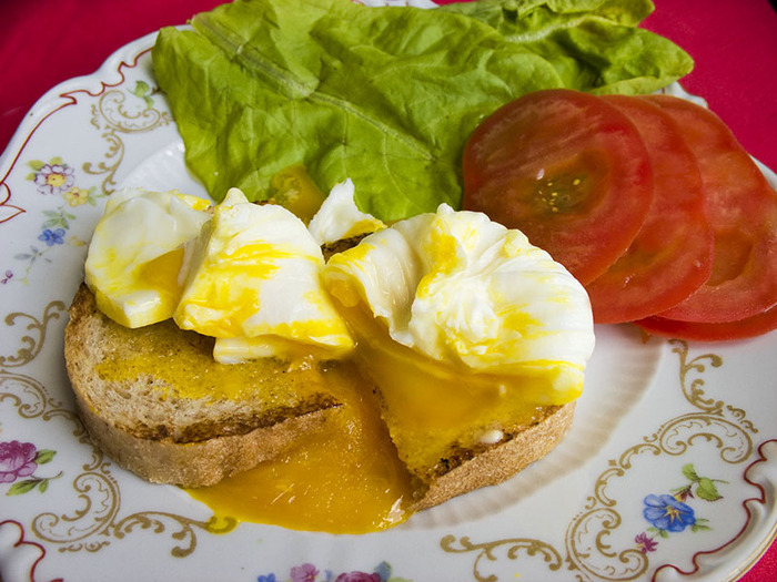 The most traditionally pashot eggs are served on a sandwich of live bread