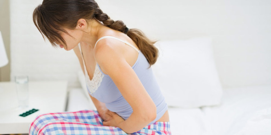 A woman has a stomach hurt from an ectopic pregnancy