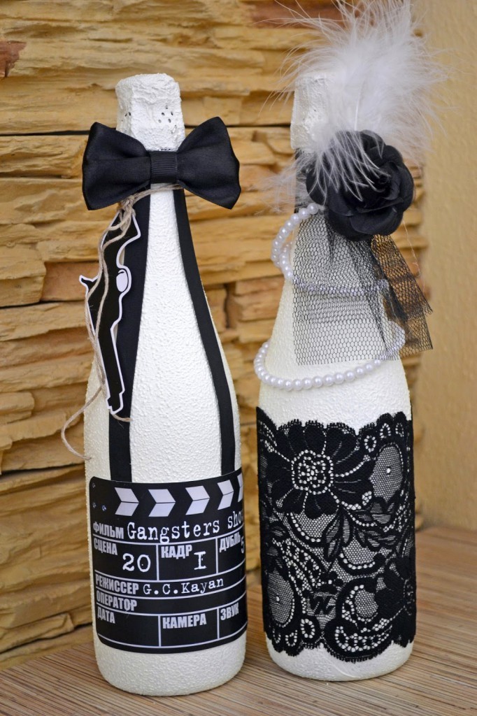 Unusual bottles of decoupage technique in the style of the bride and groom