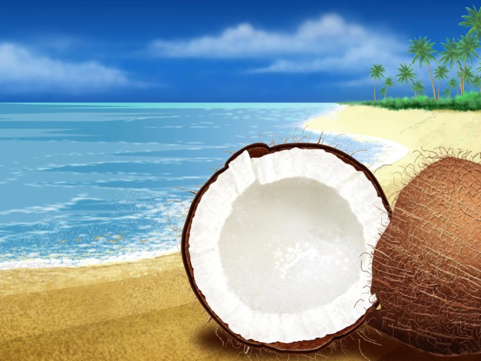 Расколотый кокосовый орех на фоне пляжа