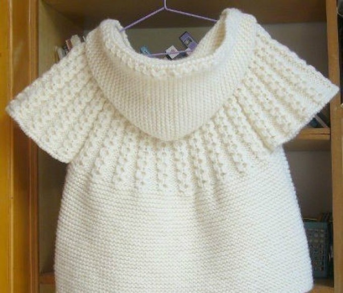 Beautiful, fashionable children's vest for a white girl with a hood: scheme, pattern