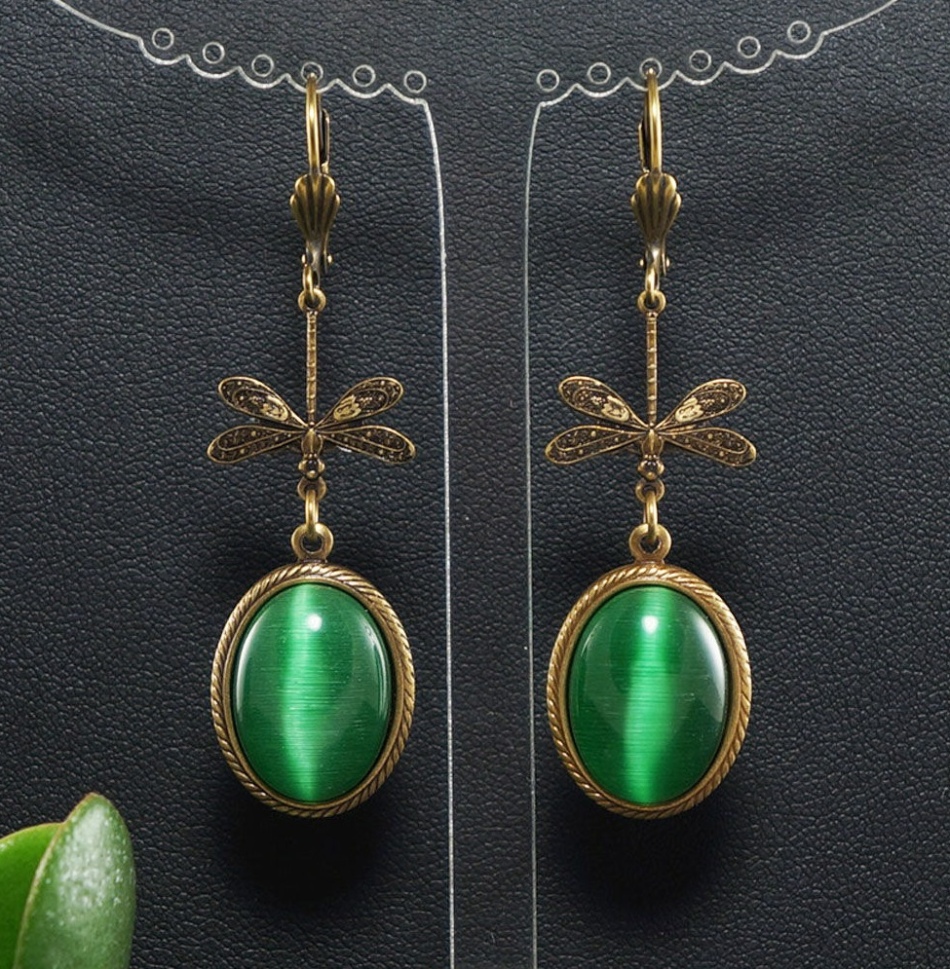 Earrings with a cat's eye and a fashionable motive with insects on 2022-2023