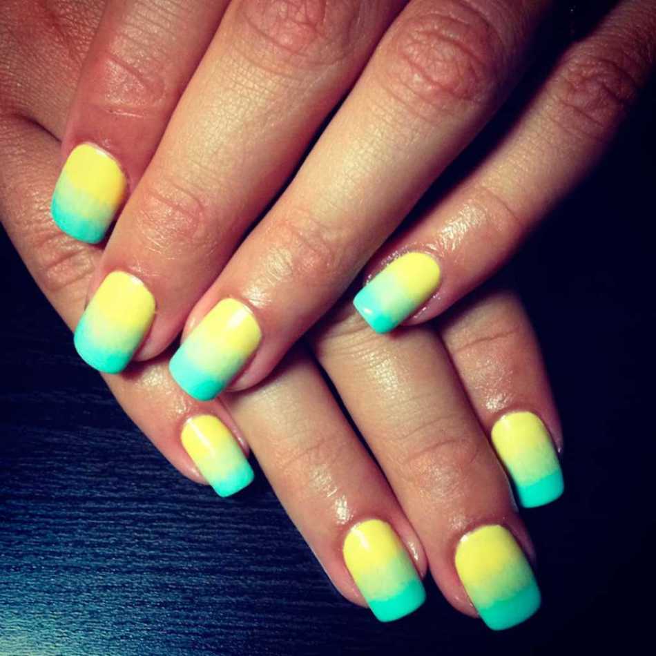 Gradient in a turquoise manicure with yellow