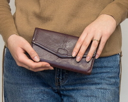 Bisakah saya membeli dompet dari tangan Anda? Bagaimana cara membersihkan dompet bekas dari energi orang lain? Aturan untuk memperoleh dompet