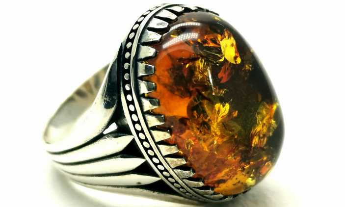 Men's ring with a stone-worm-amber