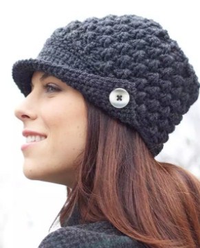 Knitted hat with a visor